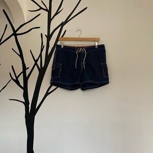 Good Vibes navy + orange swim trunks